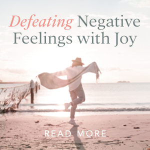 picture of free young person on a beach with the words ‘Defeating Negative Feelings with Joy’